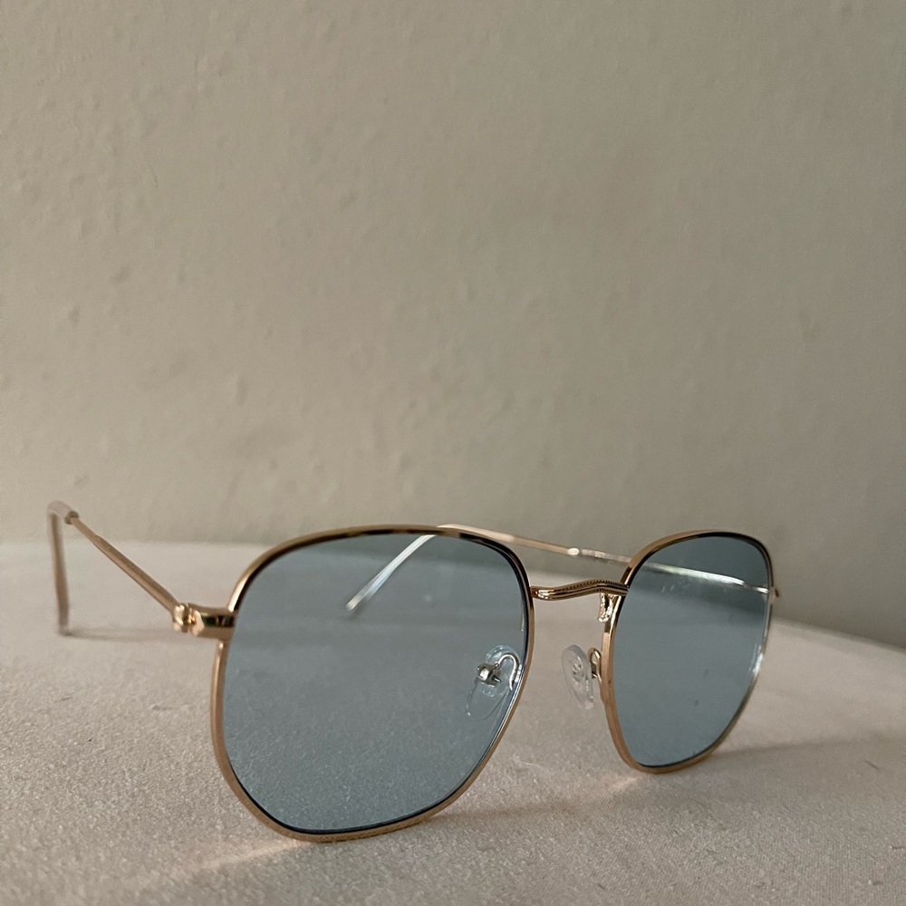 Charming Charlie sunglasses - light blue tint with gold frame detail
